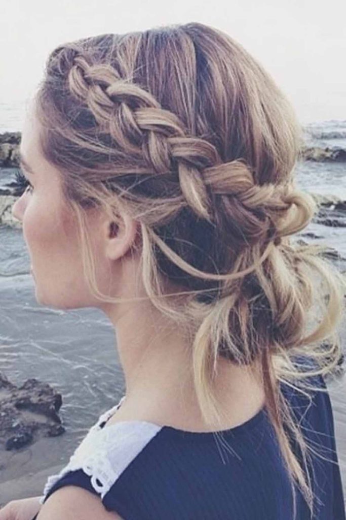 Side Loose Braid With Low Messy Bun
