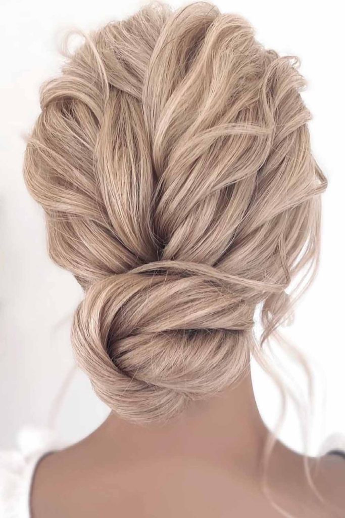 Textured Low Bun with Soft Loose Strands
