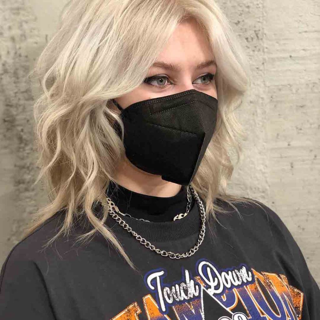 Medium Blonde Fluffy Wolf Cut With Curtain Bangs