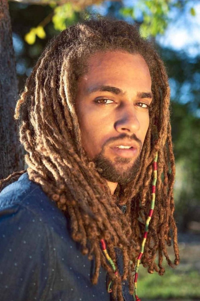Sun-Kissed Dreadlock Style With Beads