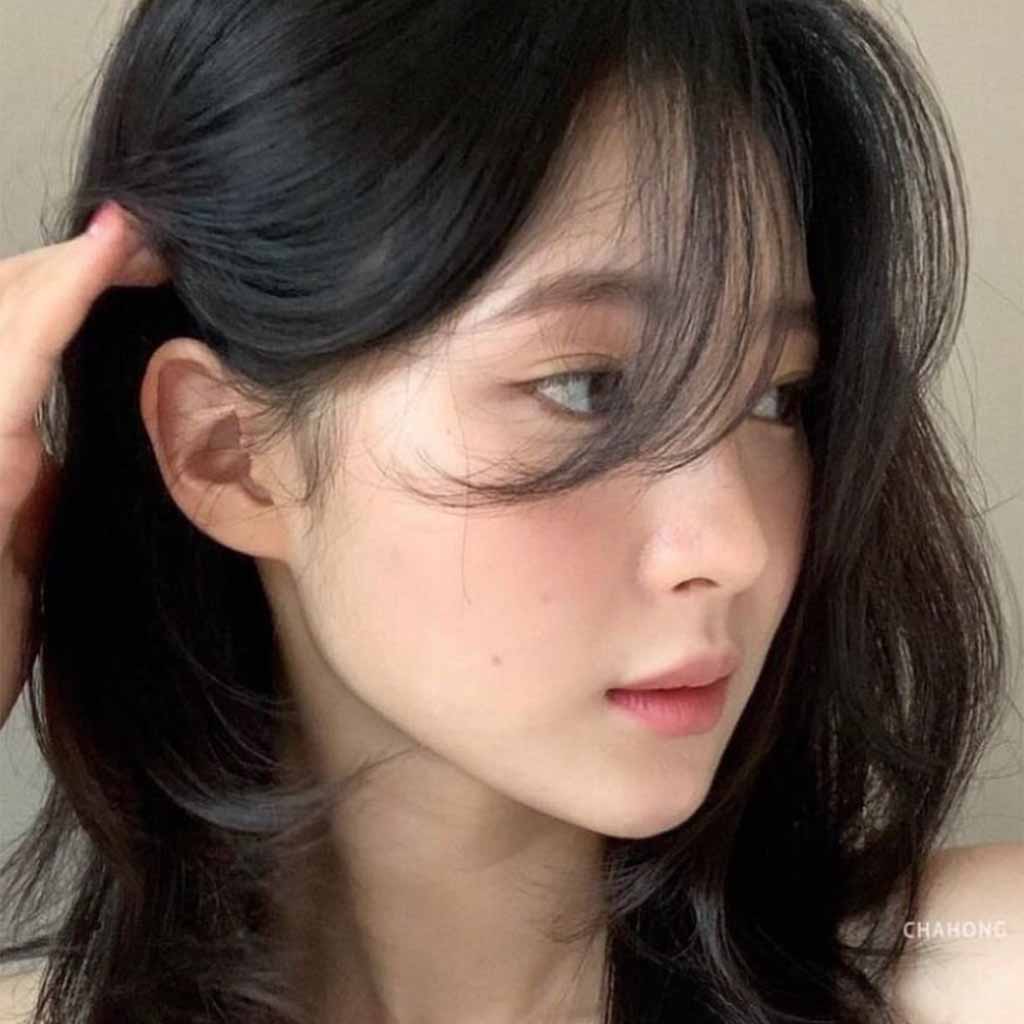 Medium K-Pop Wolf Cut With Wispy Bangs