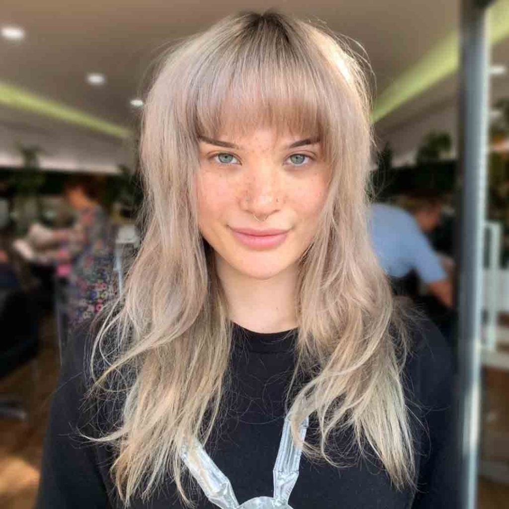 Blonde Octopus Wolf Cut With Choppy Bangs
