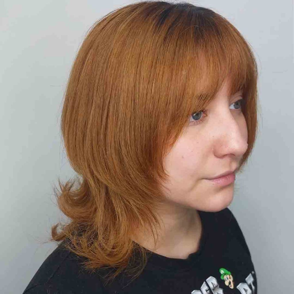 Octopus Cut on Copper Bob Length Hair With Bangs