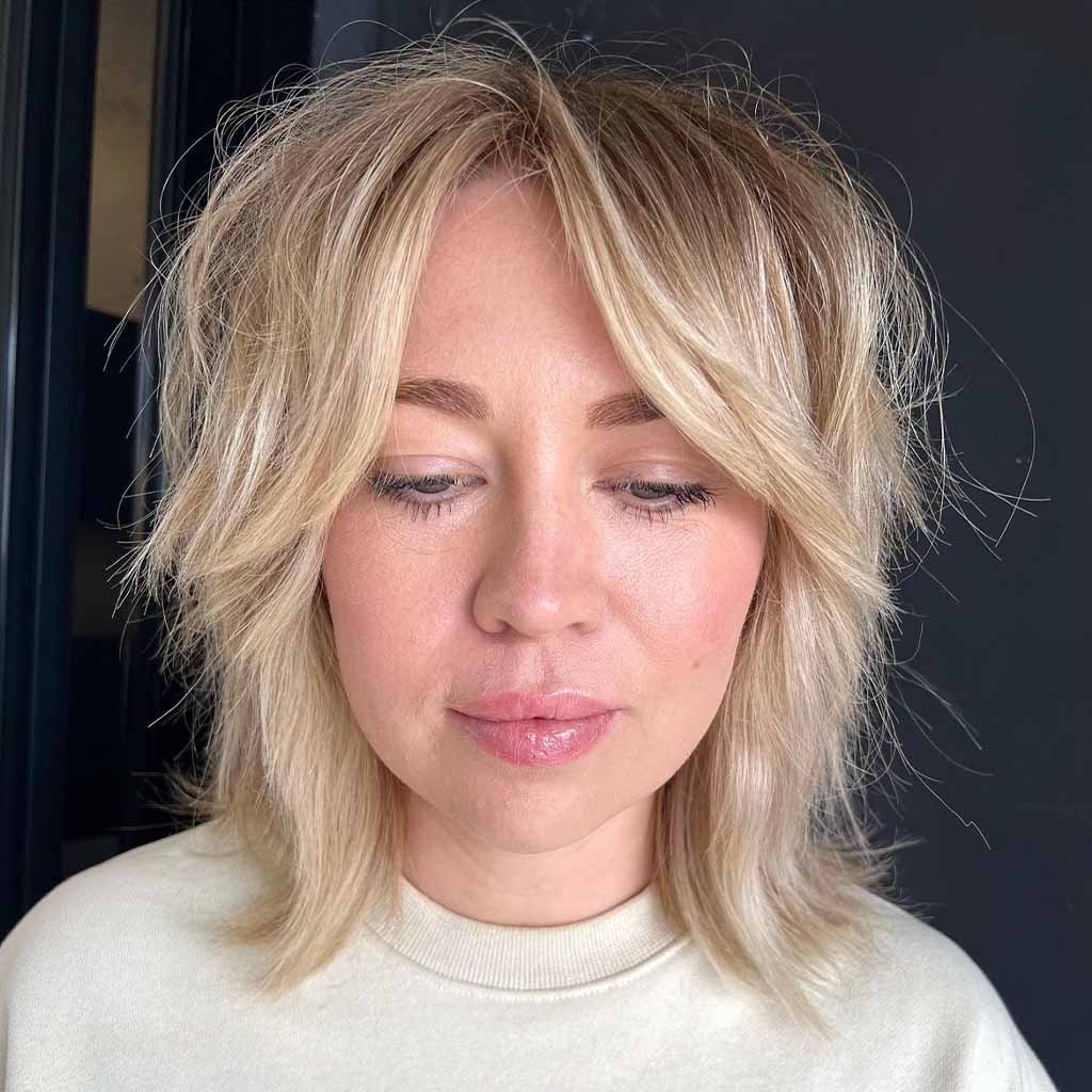 Short Blonde Mullet Wolf Cut With Side Swept Bangs