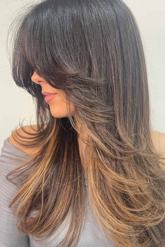 Butterfly Face Framing Layered Cut With Blonde Highlights at the Bottom