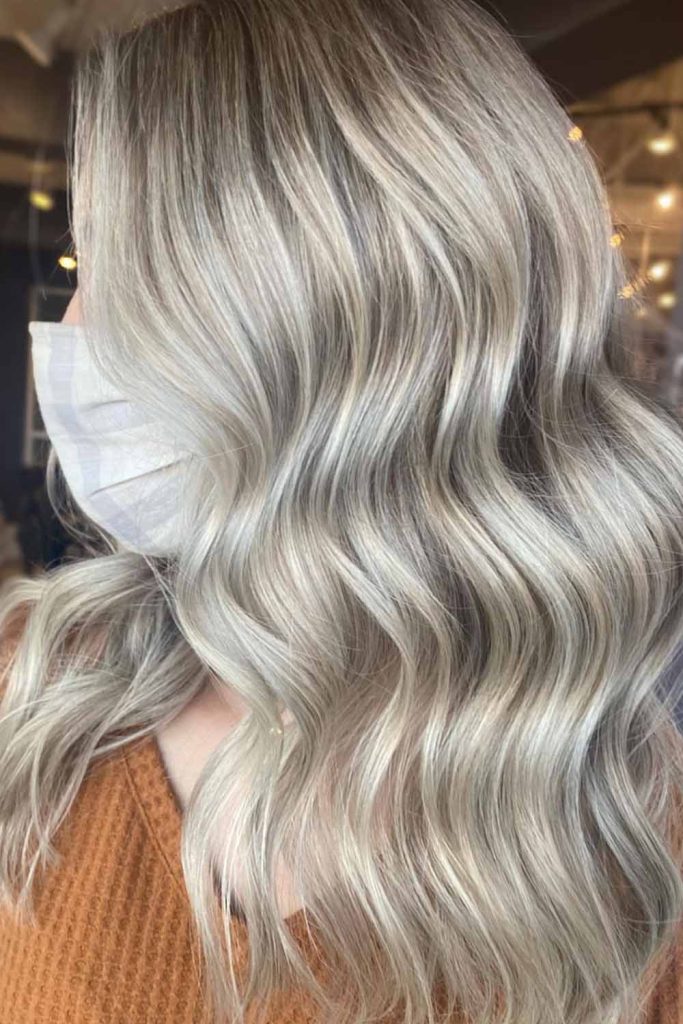 Elegant Blonde Waves Enhanced With Low Lights