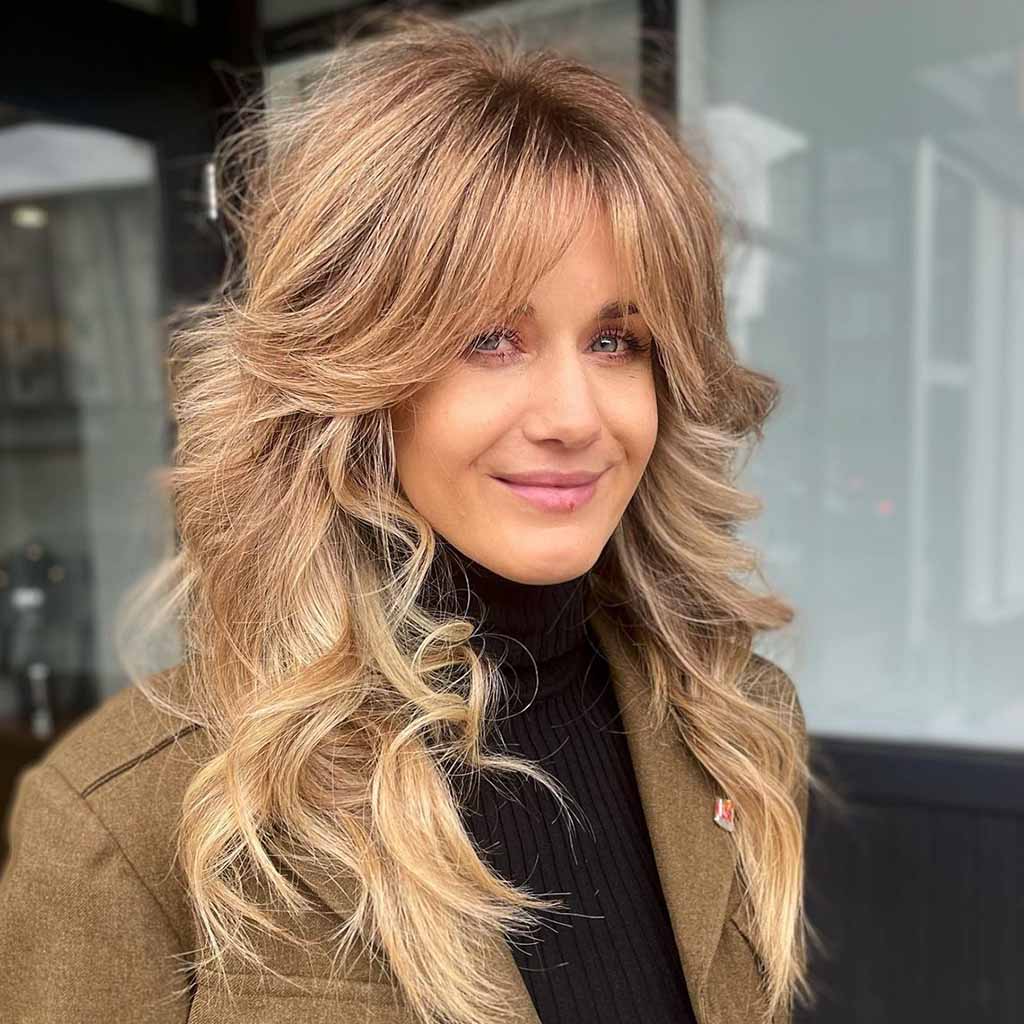 Long Wavy Fluffy Wolf Cut With Curtain Bangs