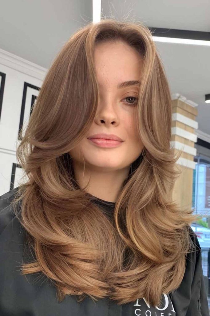 Medium Length Butterfly Cut with Curtain Bangs
