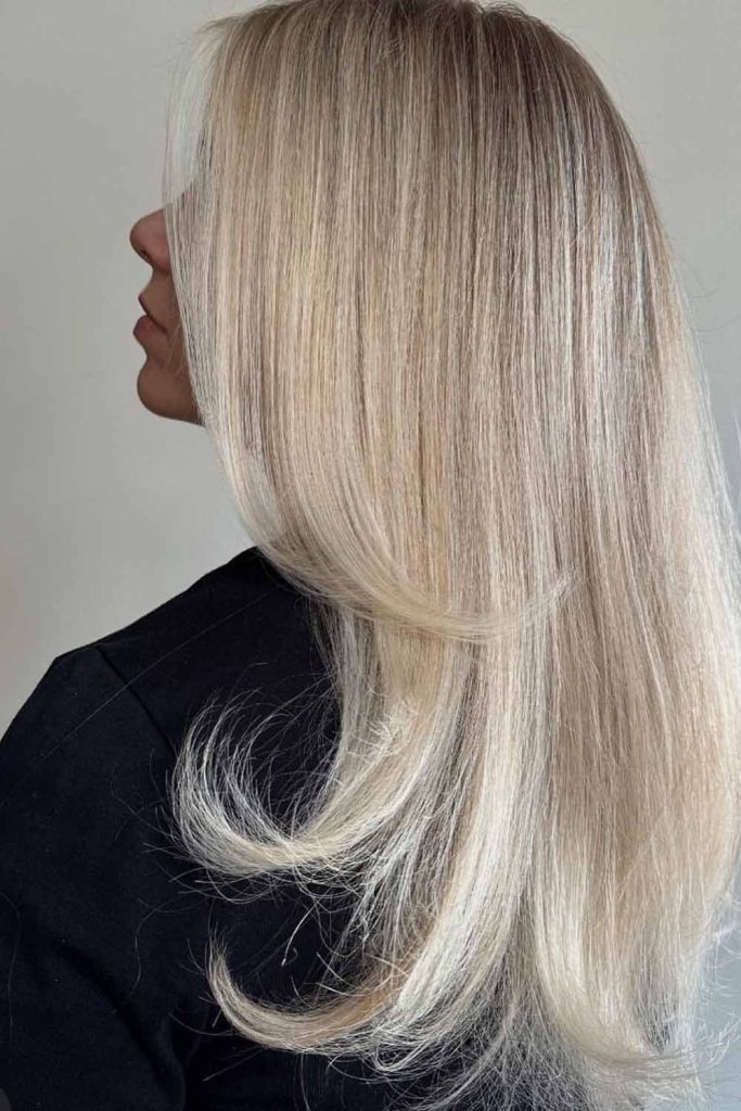 Glamorous Blonde Curls With Dimensional Low Lights