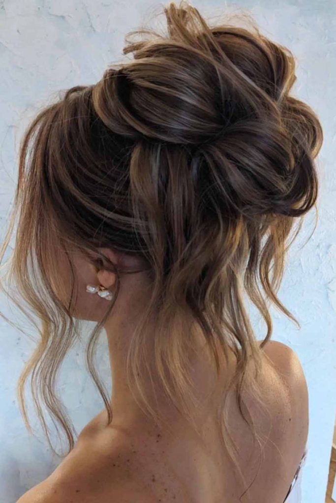 Messy Brunette Updo With Blonde Highlights