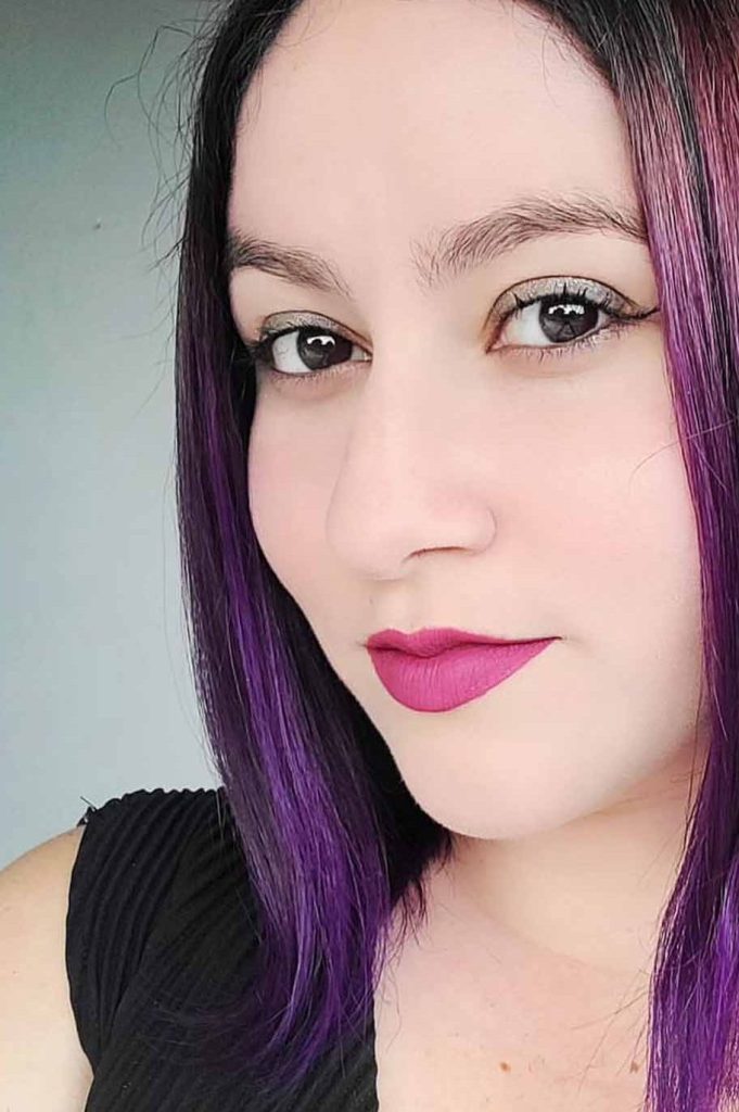 Purple-Pink Highlights on Angled Bob Hair