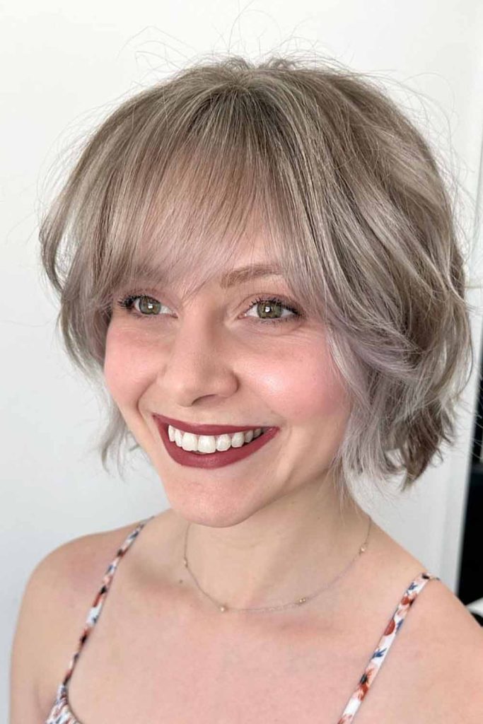 Bixie Haircut With Silver Highlights and Wispy Bangs